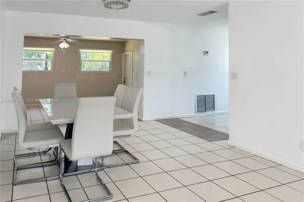 a bathroom with a sink a toilet and bathtub