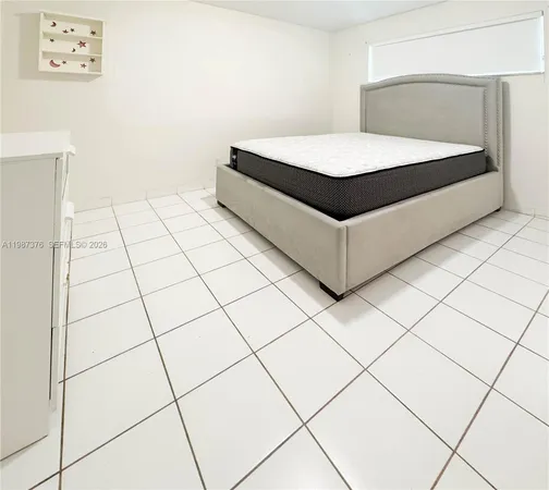 a view of a livingroom with furniture and window