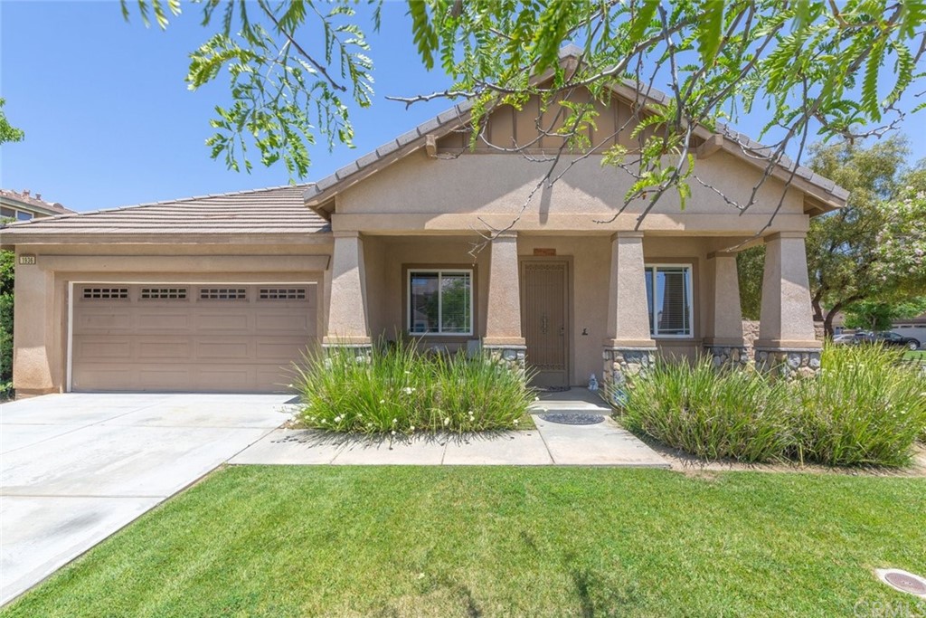 1936 Spring White Road Hemet, CA 92545 - Photo 1 of 1 a front view of a house with garden
