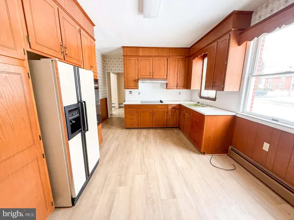 a bathroom with a sink and shower