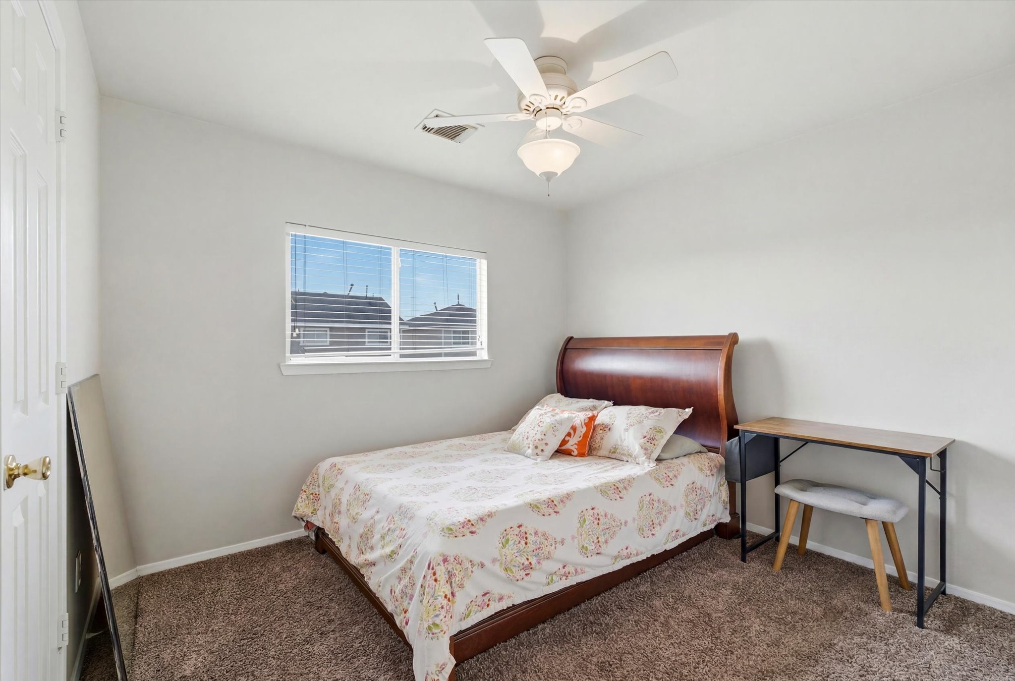 3946 Mossy Pl Lane Spring, TX 77388 - Photo 11 of 17 This comfortable bedroom offers a clean canvas with light neutral walls and plush carpeting underfoot - complete with window blinds and a spacious closet.