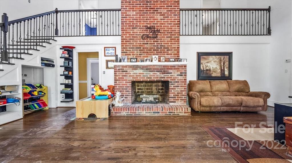 4410 Ansonville Road Marshville, NC 28103 - Photo 12 of 47 a living room with furniture and a fireplace