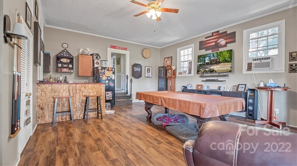 4410 Ansonville Road Marshville, NC 28103 - Photo 16 of 47 a living room with furniture and wooden floor