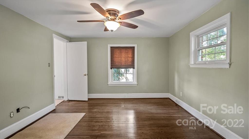 4410 Ansonville Road Marshville, NC 28103 - Photo 27 of 47 a view of an empty room with wooden floor and a window