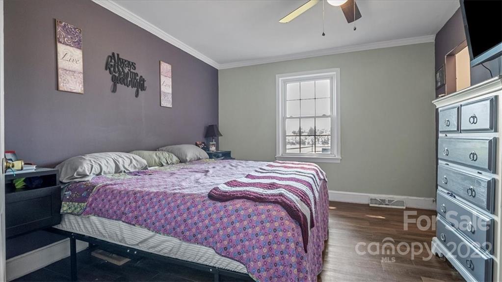 4410 Ansonville Road Marshville, NC 28103 - Photo 40 of 47 a bedroom with a bed and a window