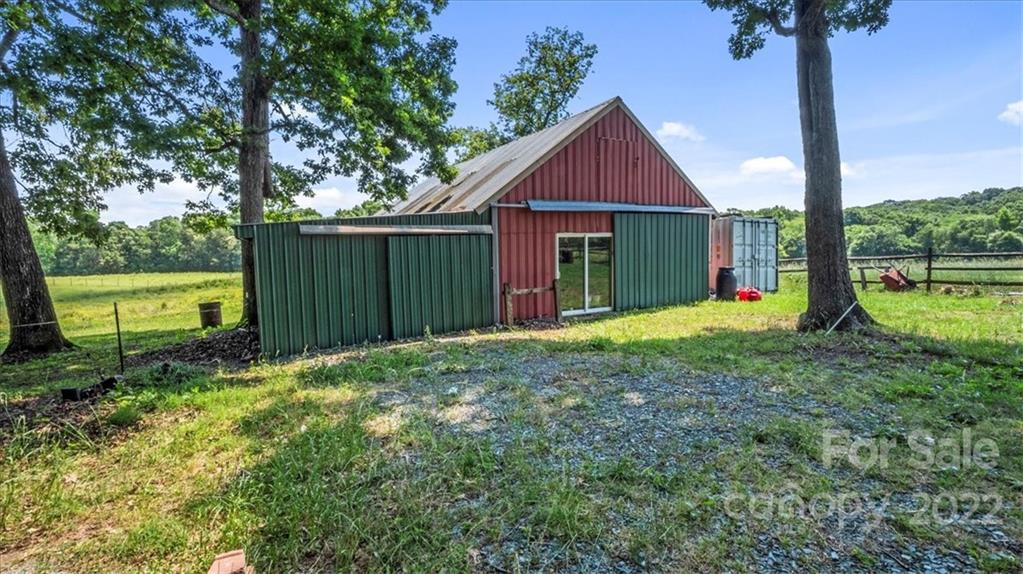 4410 Ansonville Road Marshville, NC 28103 - Photo 7 of 47 a view of a house with backyard and a tree