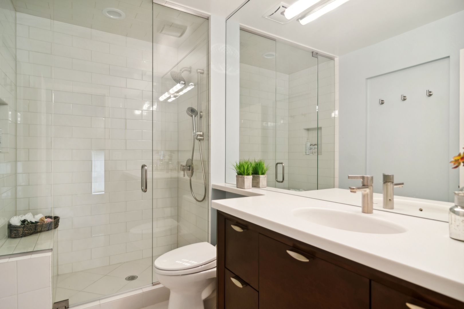 571 Quaker Ridge Court Vernon Hills, IL 60061 - Photo 11 of 17 a bathroom with a sink a toilet and shower