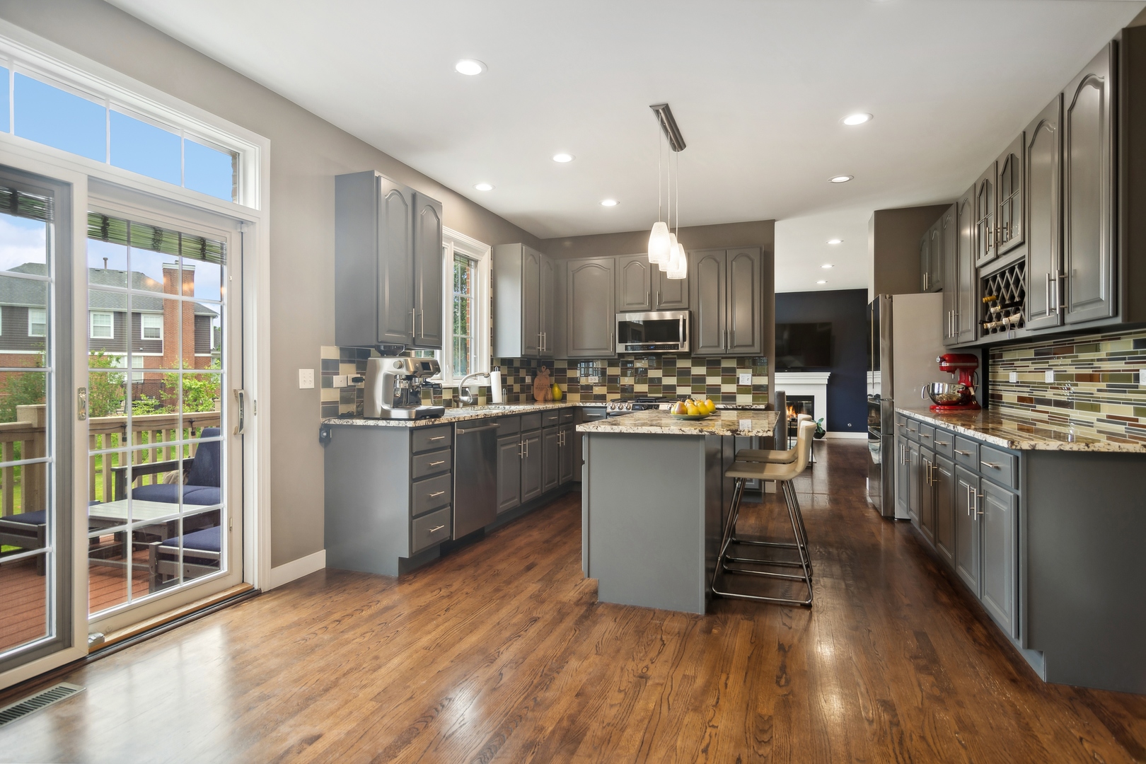 571 Quaker Ridge Court Vernon Hills, IL 60061 - Photo 5 of 17 a kitchen with a sink a counter top space stainless steel appliances and cabinets