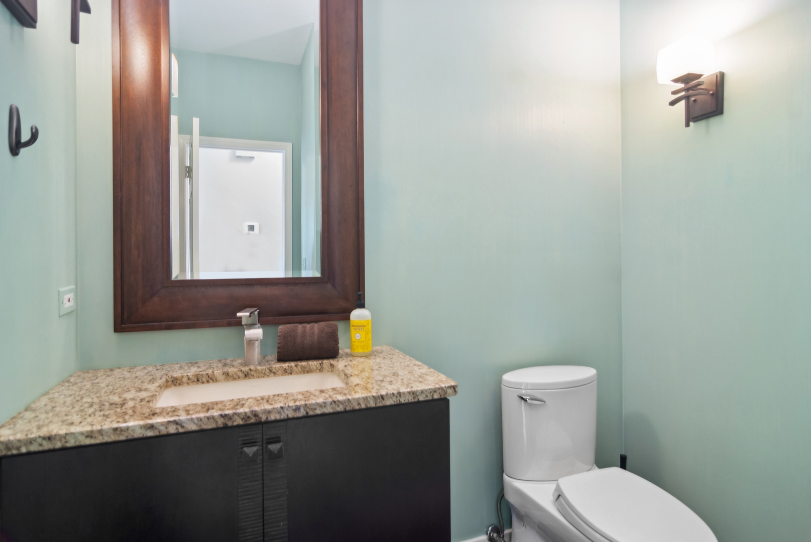571 Quaker Ridge Court Vernon Hills, IL 60061 - Photo 6 of 17 a bathroom with a granite countertop sink and a mirror