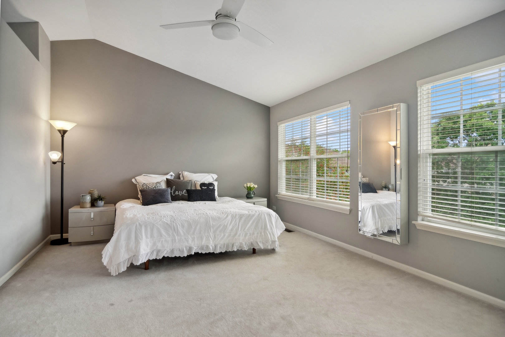 571 Quaker Ridge Court Vernon Hills, IL 60061 - Photo 7 of 17 a bedroom with a bed and large window