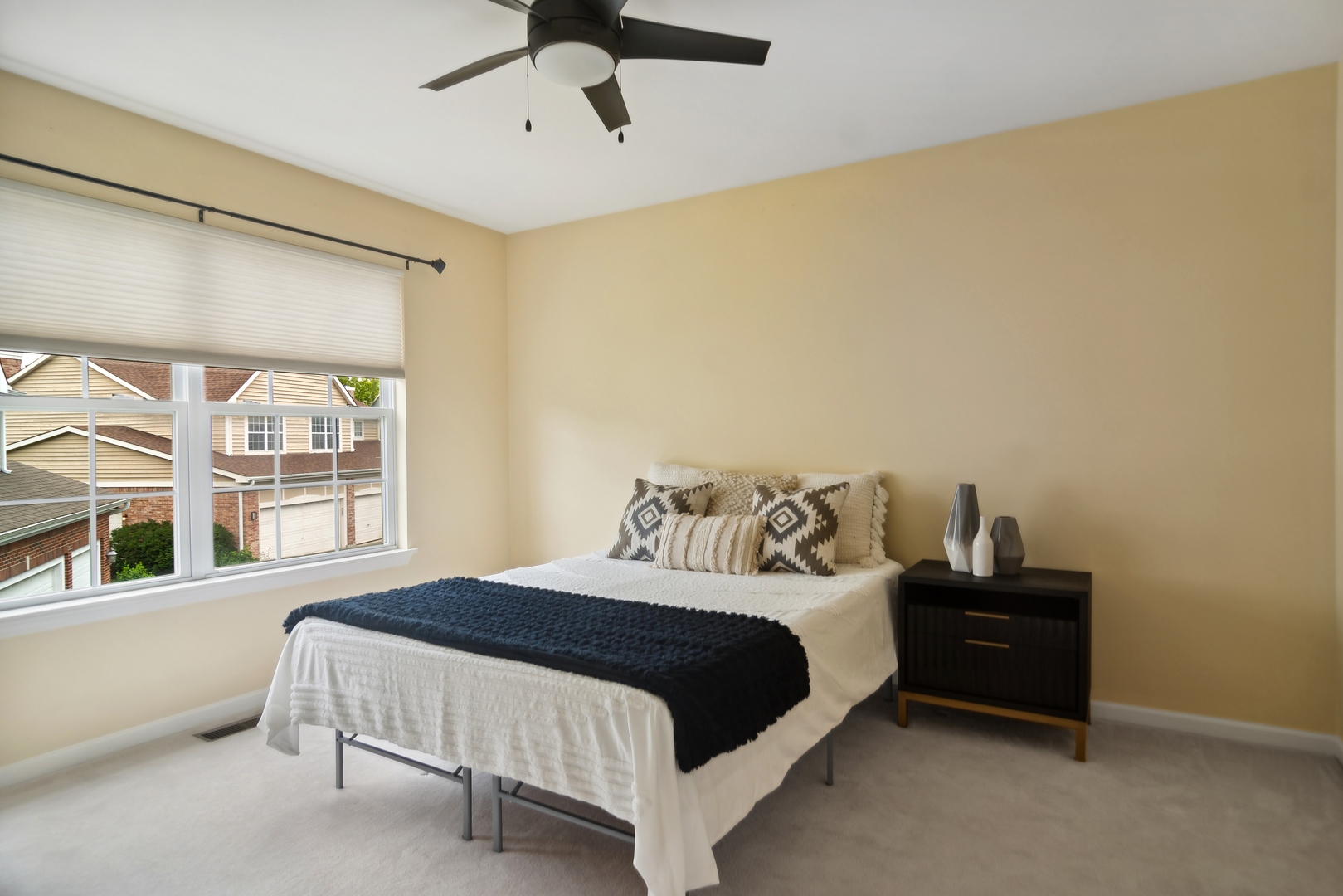 571 Quaker Ridge Court Vernon Hills, IL 60061 - Photo 10 of 17 a bedroom with a bed and a window