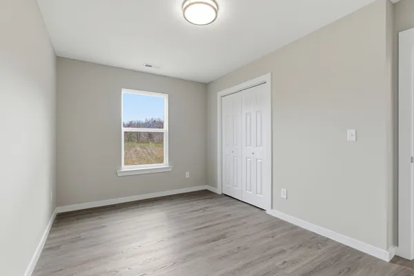 a view of livingroom with hardwood floor and hallway