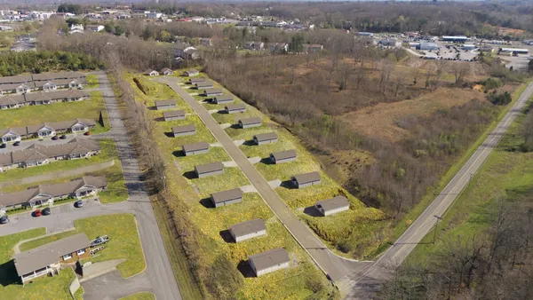 a view of swimming pool with seating area