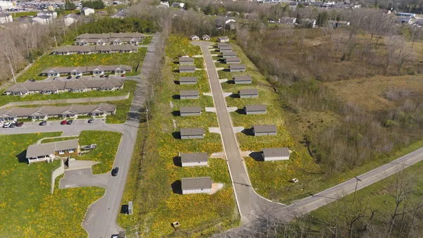 a house view with a garden space