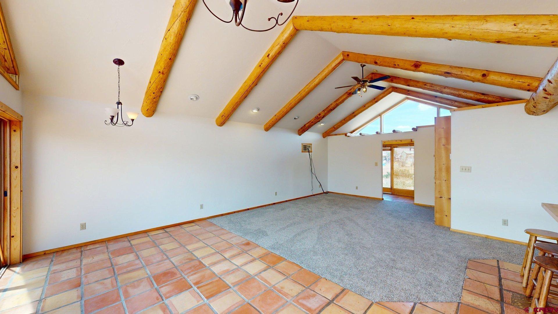 40557 M75 Road Paonia, CO 81428 - Photo 4 of 34 a view of a room with wooden floor and door