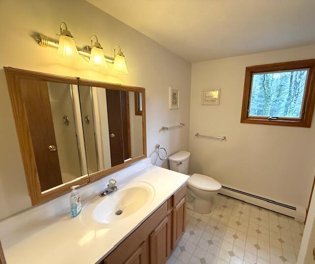 8 Bridgets Path Centerville, MA 02632 - Photo 16 of 43 a bathroom with a sink and a mirror