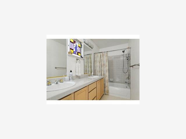 111 Whits Road Mountain View, CA 94040 - Photo 8 of 9 a bathroom with a tub sink and mirror