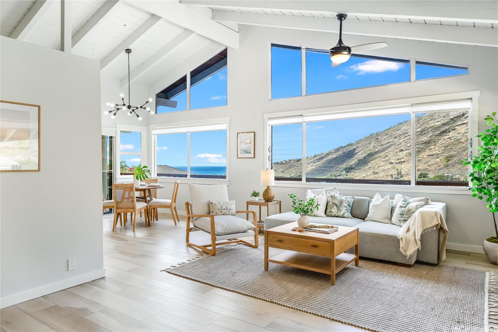 817 Ekoa Place Honolulu, HI 96821 - Photo 1 of 25 a living room with furniture and a table