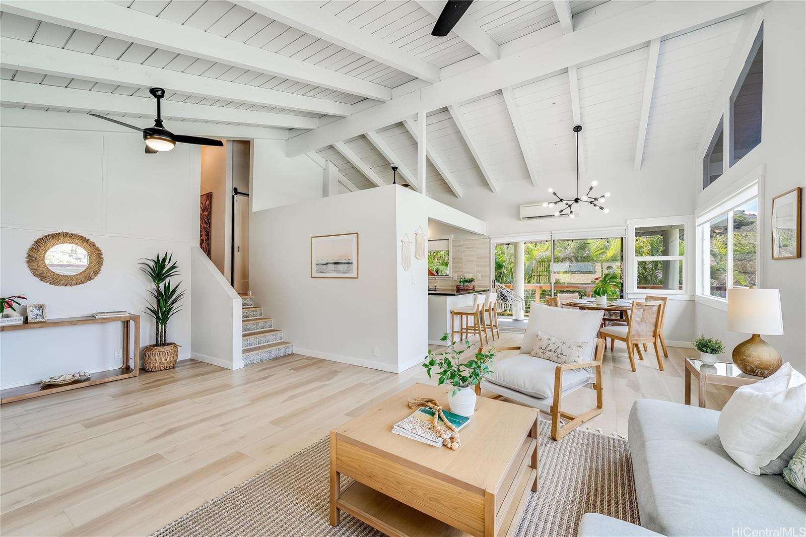817 Ekoa Place Honolulu, HI 96821 - Photo 4 of 25 a living room with furniture and a large window