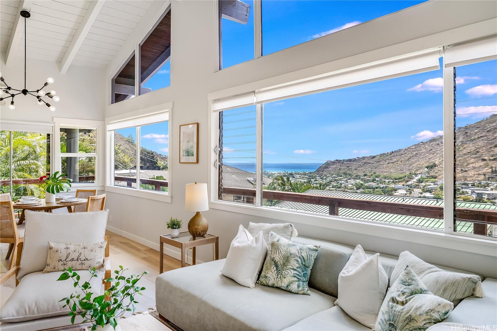 817 Ekoa Place Honolulu, HI 96821 - Photo 5 of 25 a living room with furniture and a floor to ceiling window