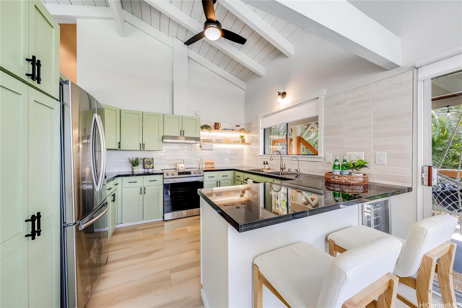 817 Ekoa Place Honolulu, HI 96821 - Photo 9 of 25 a kitchen with stainless steel appliances granite countertop a sink a stove and a refrigerator