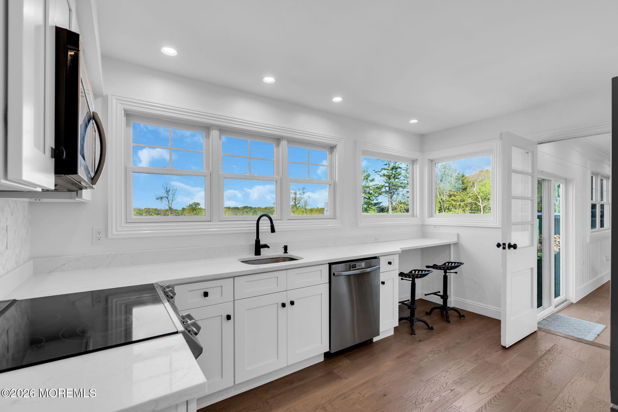 393 County Road 537 Colts Neck, NJ 07722 - Photo 13 of 41 a kitchen with a sink appliances and cabinets
