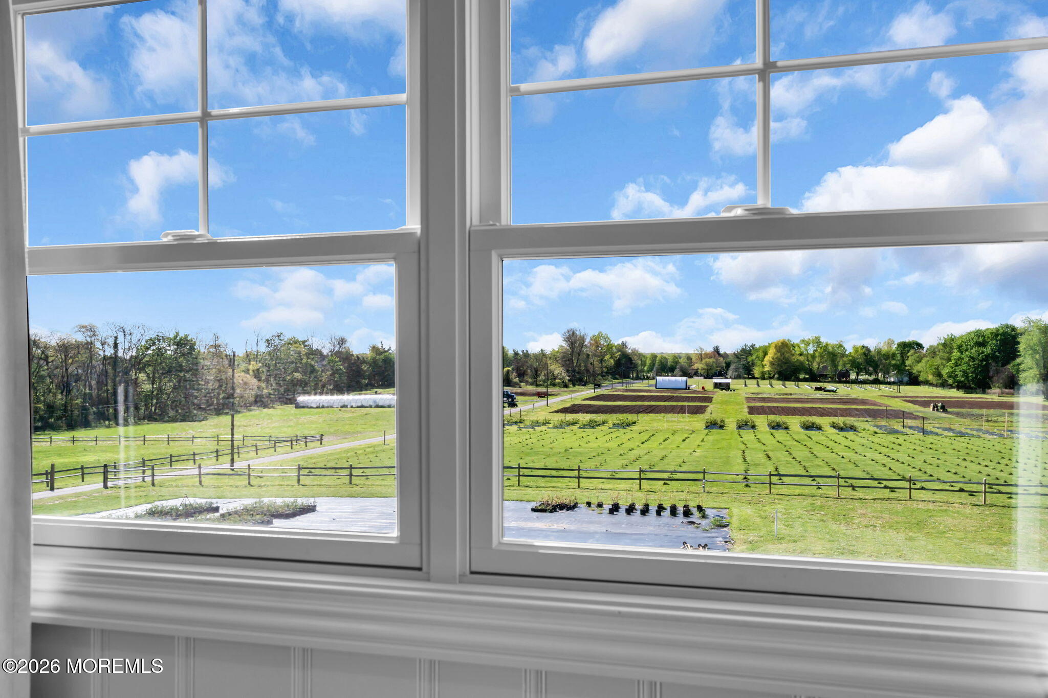 393 County Road 537 Colts Neck, NJ 07722 - Photo 17 of 41 a view of a glass door with a yard from a window