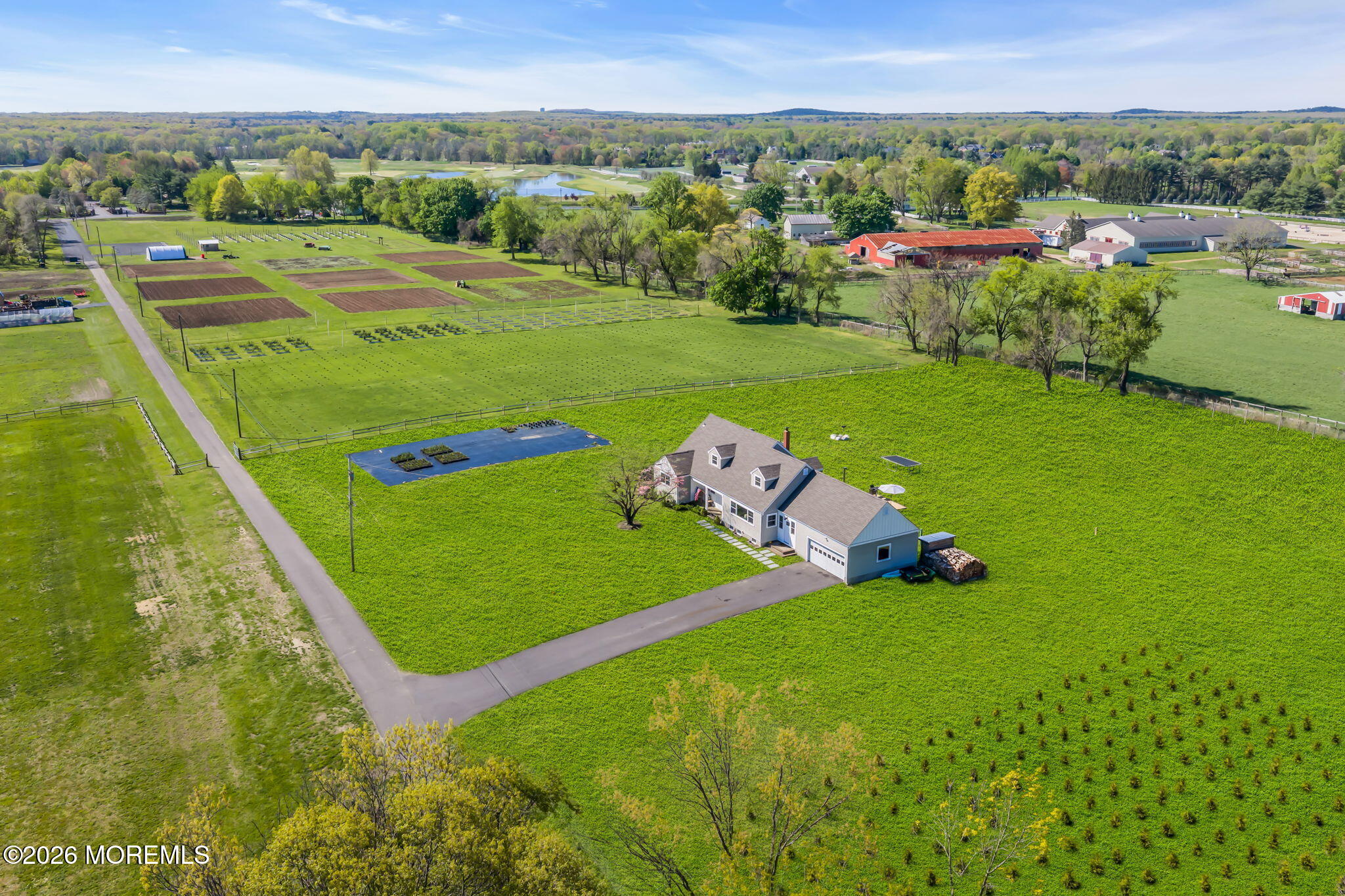 393 County Road 537 Colts Neck, NJ 07722 - Photo 2 of 41 a view of a lush green field