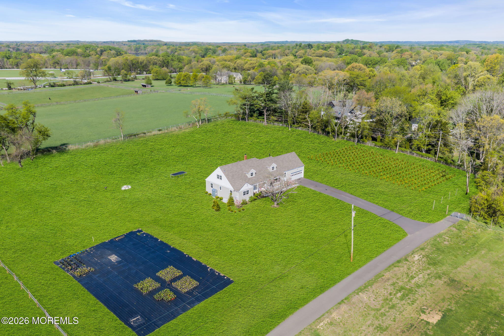 393 County Road 537 Colts Neck, NJ 07722 - Photo 23 of 41 a view of a field with an ocean