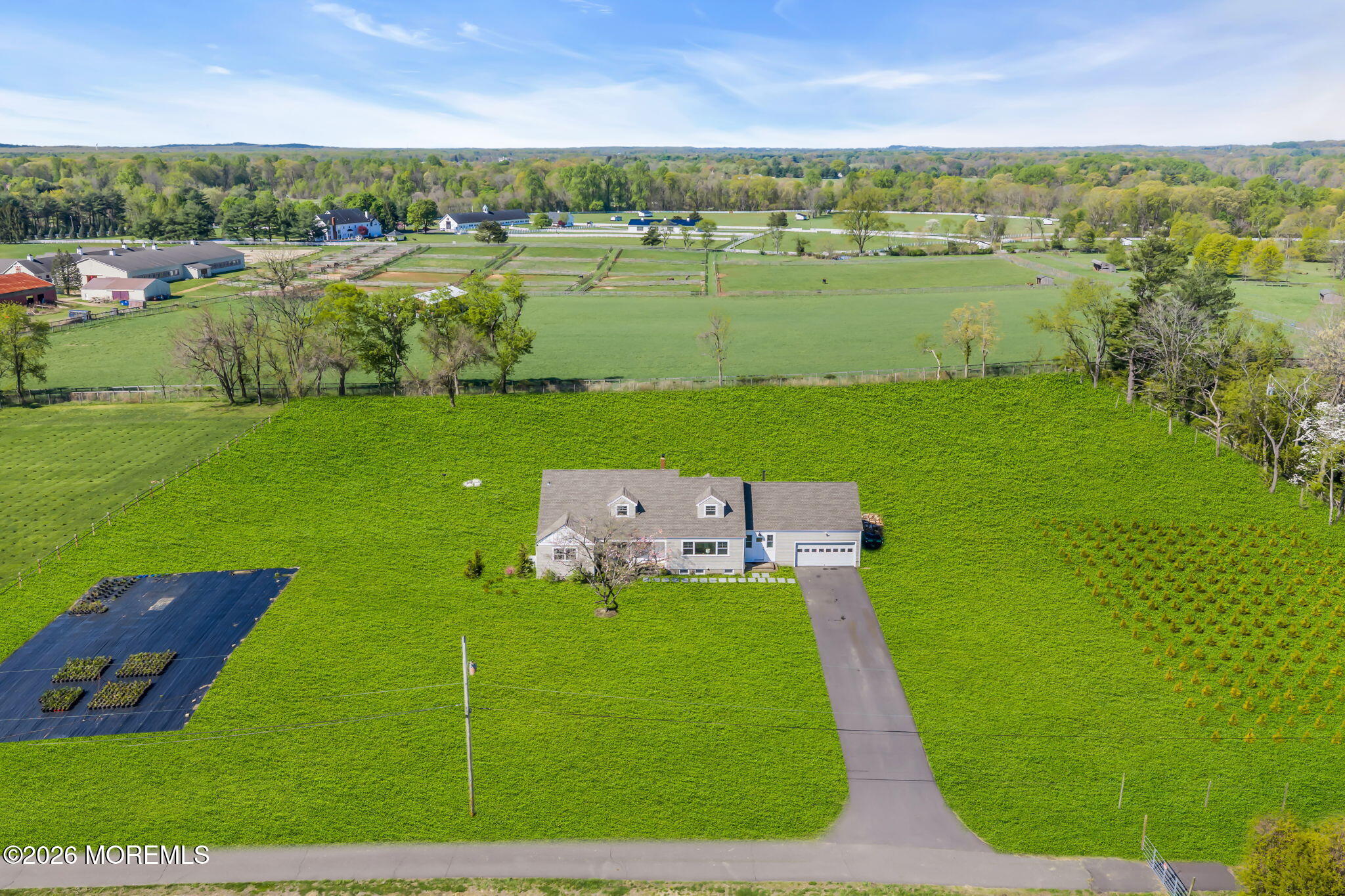 393 County Road 537 Colts Neck, NJ 07722 - Photo 4 of 41 an aerial view of a houses with a yard