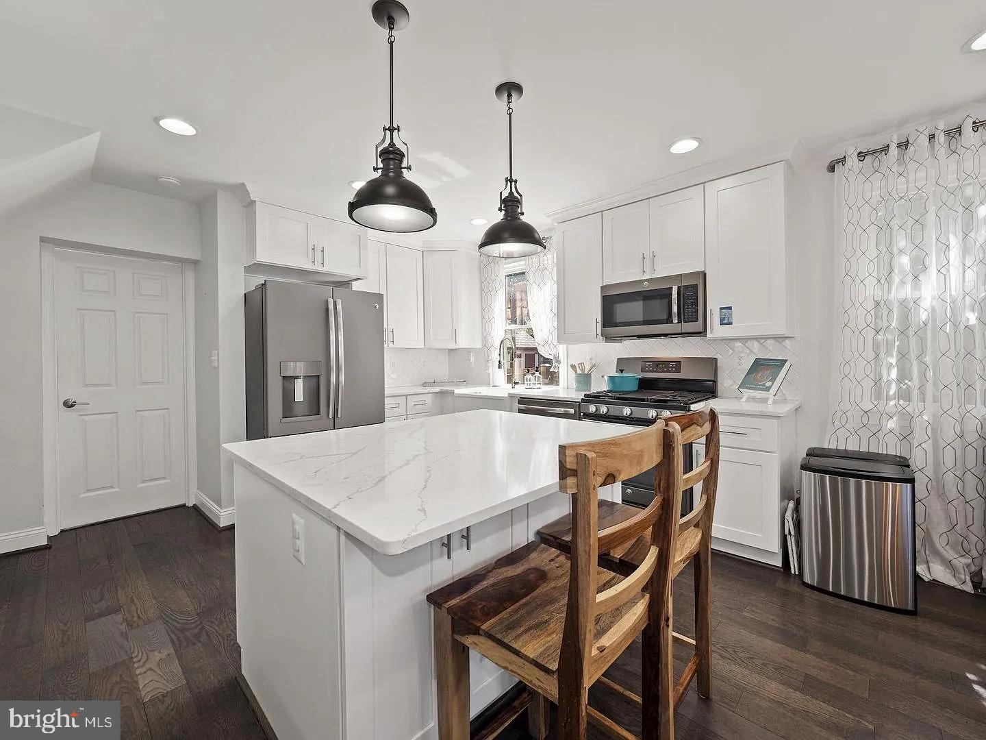 2605 Arcola Avenue Silver Spring, MD 20902 - Photo 7 of 30 Modern kitchen with sleek finishes.
