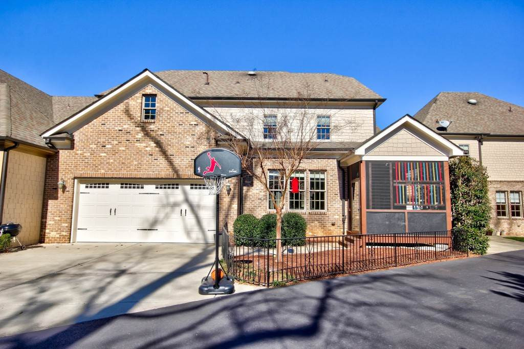 3417 Ebenezer Church Road Raleigh, NC 27612 - Photo 24 of 25 2 car garage with rear entry on a private drive! Screened in porch to enjoy a cocktail in and enjoy the beautiful spring time weather! Exterior Back