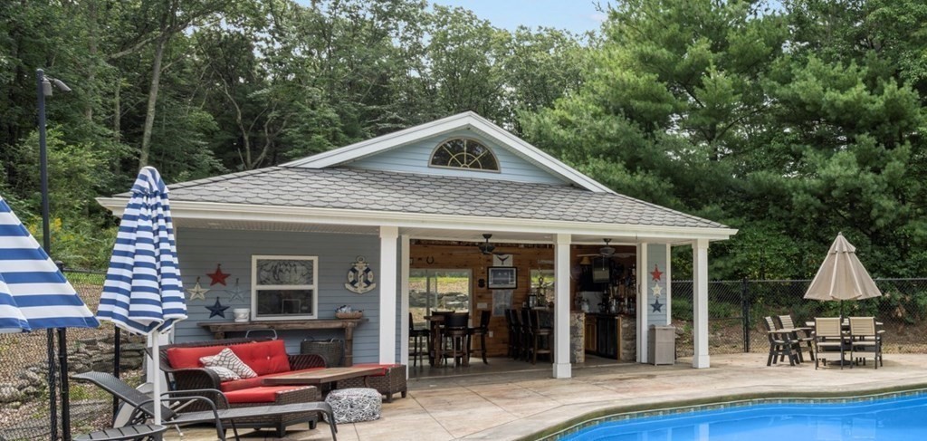 104 Burnt Swamp Road Cumberland, RI 02864 - Photo 28 of 32 a front view of house with yard outdoor seating and green space