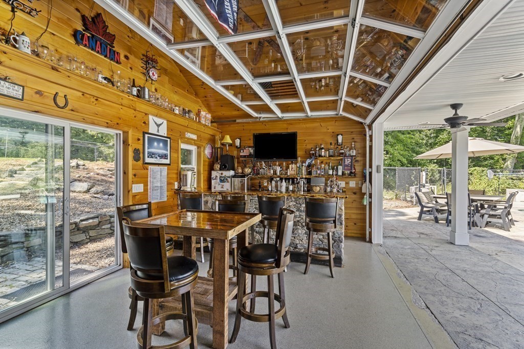 104 Burnt Swamp Road Cumberland, RI 02864 - Photo 30 of 32 a view of a dining room with furniture window and outside view