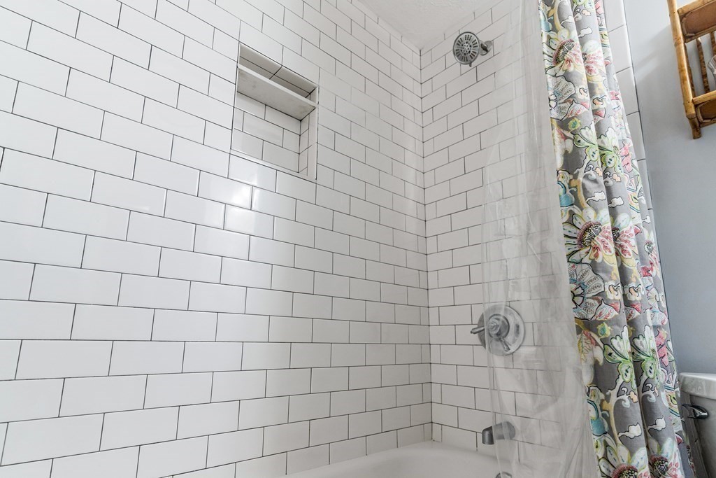 22 Sumner Street Dedham, MA 02026 - Photo 24 of 39 a bathroom with a shower