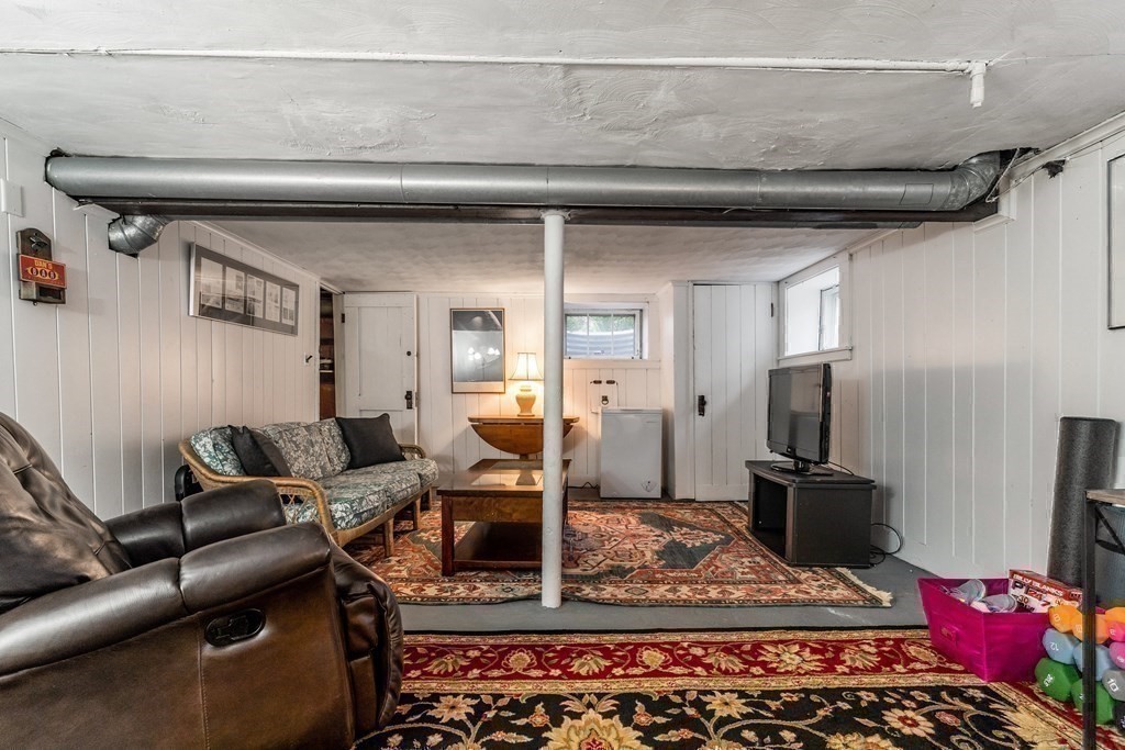 22 Sumner Street Dedham, MA 02026 - Photo 34 of 39 a living room with furniture