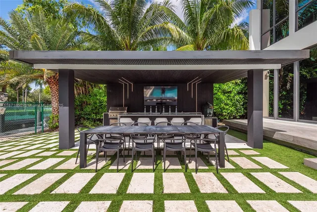 a view of an outdoor space with furniture