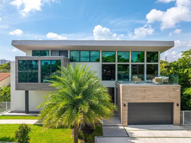 a view of front door and swimming pool