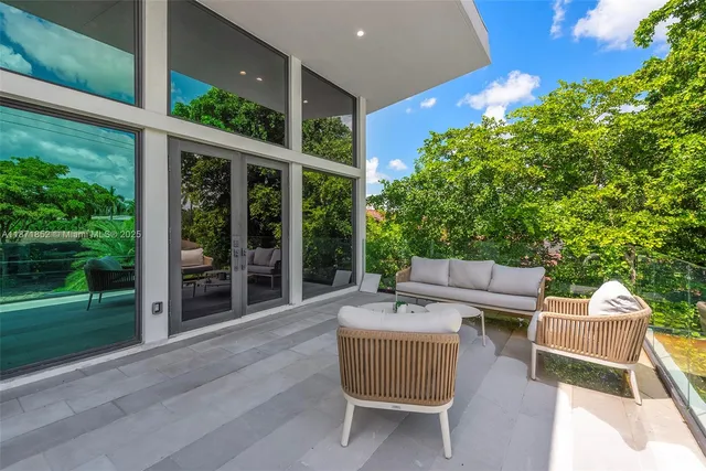 a view of a patio with a chairs in patio