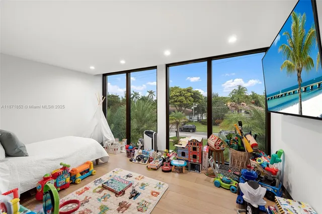 a bed room with furniture and a window
