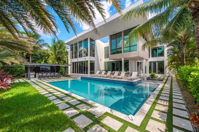 a view of a house with swimming pool