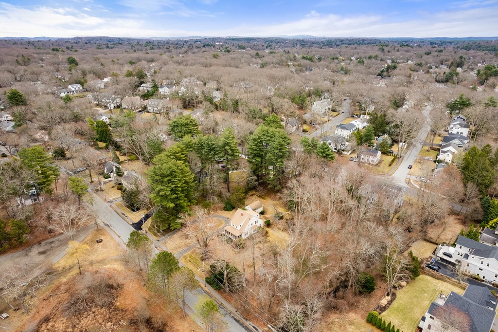 53 Elmwood Road Wellesley, MA 02481 - Photo 3 of 10 a view of a city with green field