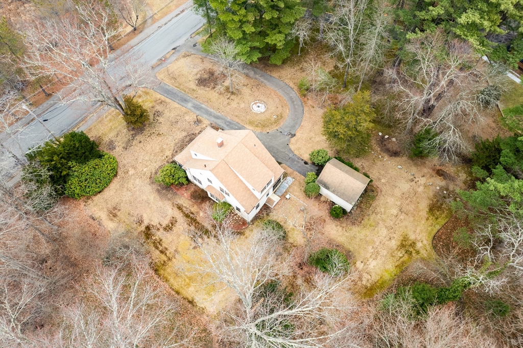 53 Elmwood Road Wellesley, MA 02481 - Photo 7 of 10 an aerial view of a house with yard and parking