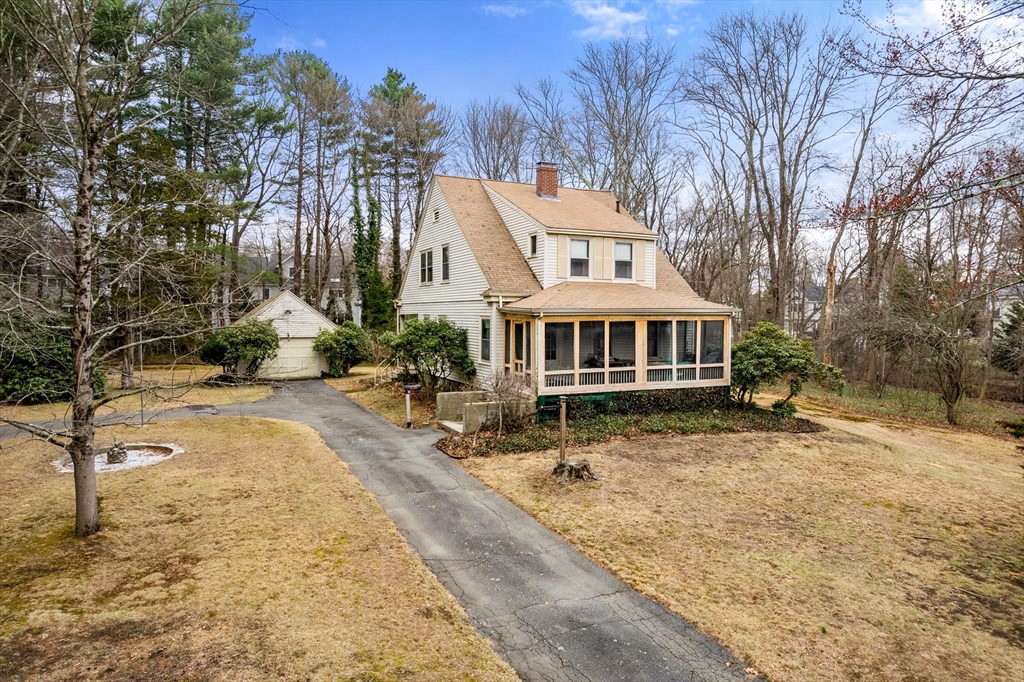 53 Elmwood Road Wellesley, MA 02481 - Photo 9 of 10 a front view of a house with a yard