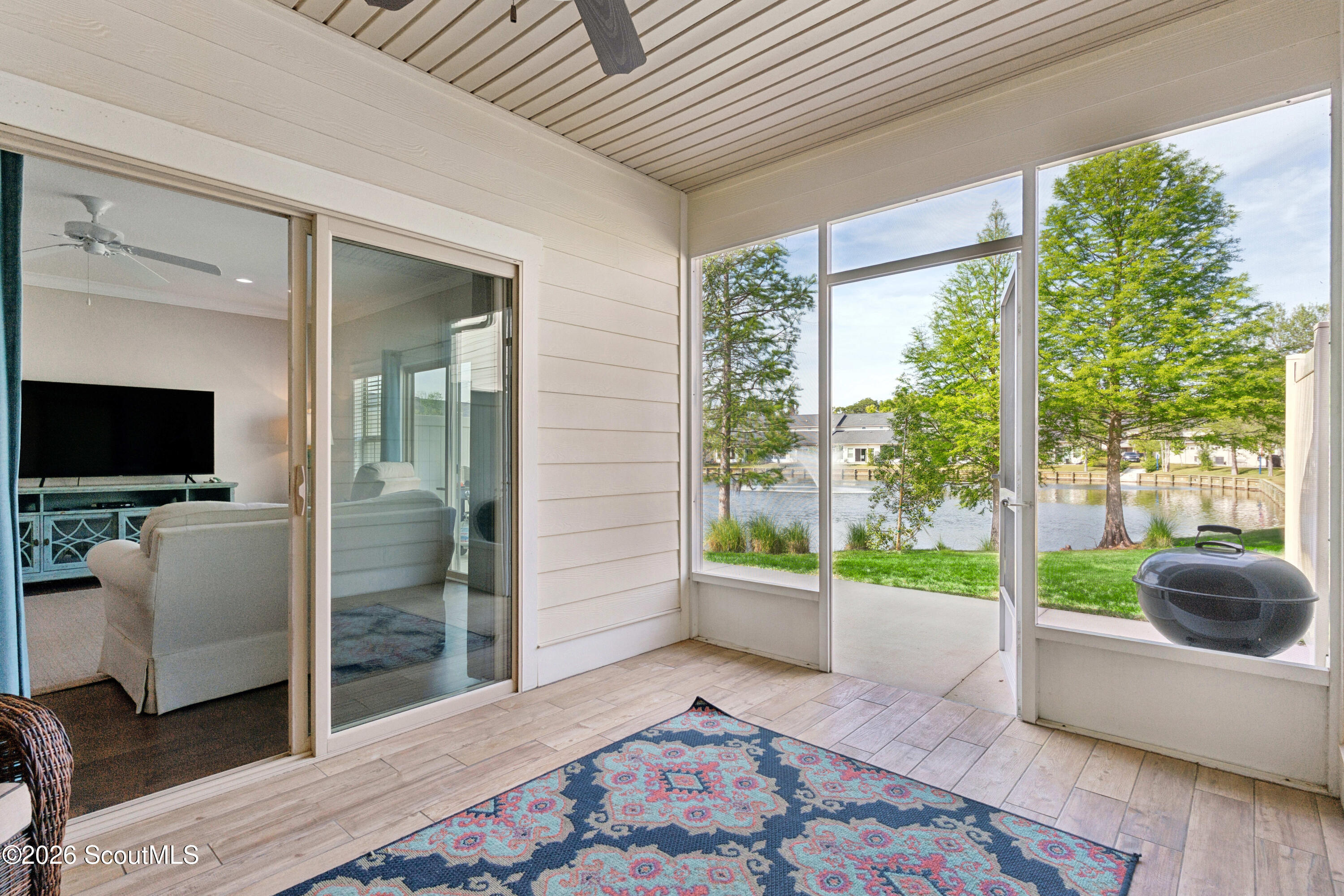 101 Mariners Circle St. Simons Island, GA 31522 - Photo 25 of 35 Screened Porch with lagoon view