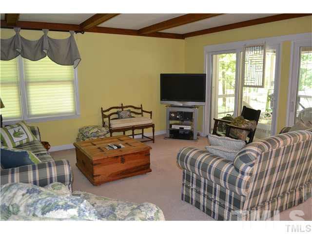 3 Fox Road Clarksville, VA 23927 - Photo 13 of 21 a bedroom with furniture and a flat screen tv