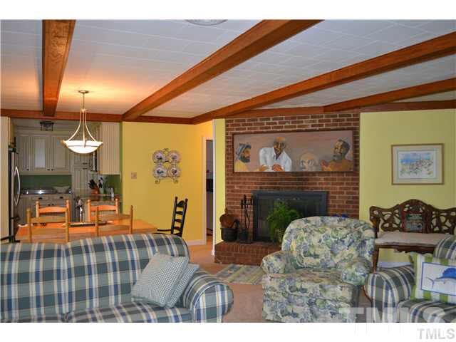 3 Fox Road Clarksville, VA 23927 - Photo 5 of 21 a bedroom with furniture and a fireplace