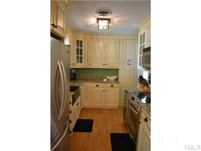 3 Fox Road Clarksville, VA 23927 - Photo 8 of 21 a kitchen with stainless steel appliances a stove and a refrigerator