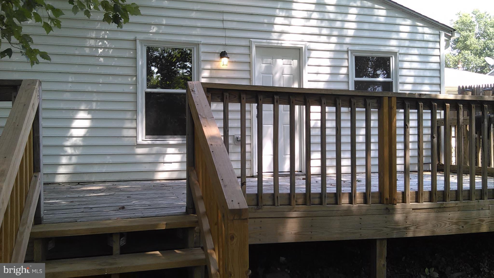 7701 Greenleaf Road Landover, MD 20785 - Photo 3 of 24 a view of a balcony with a door