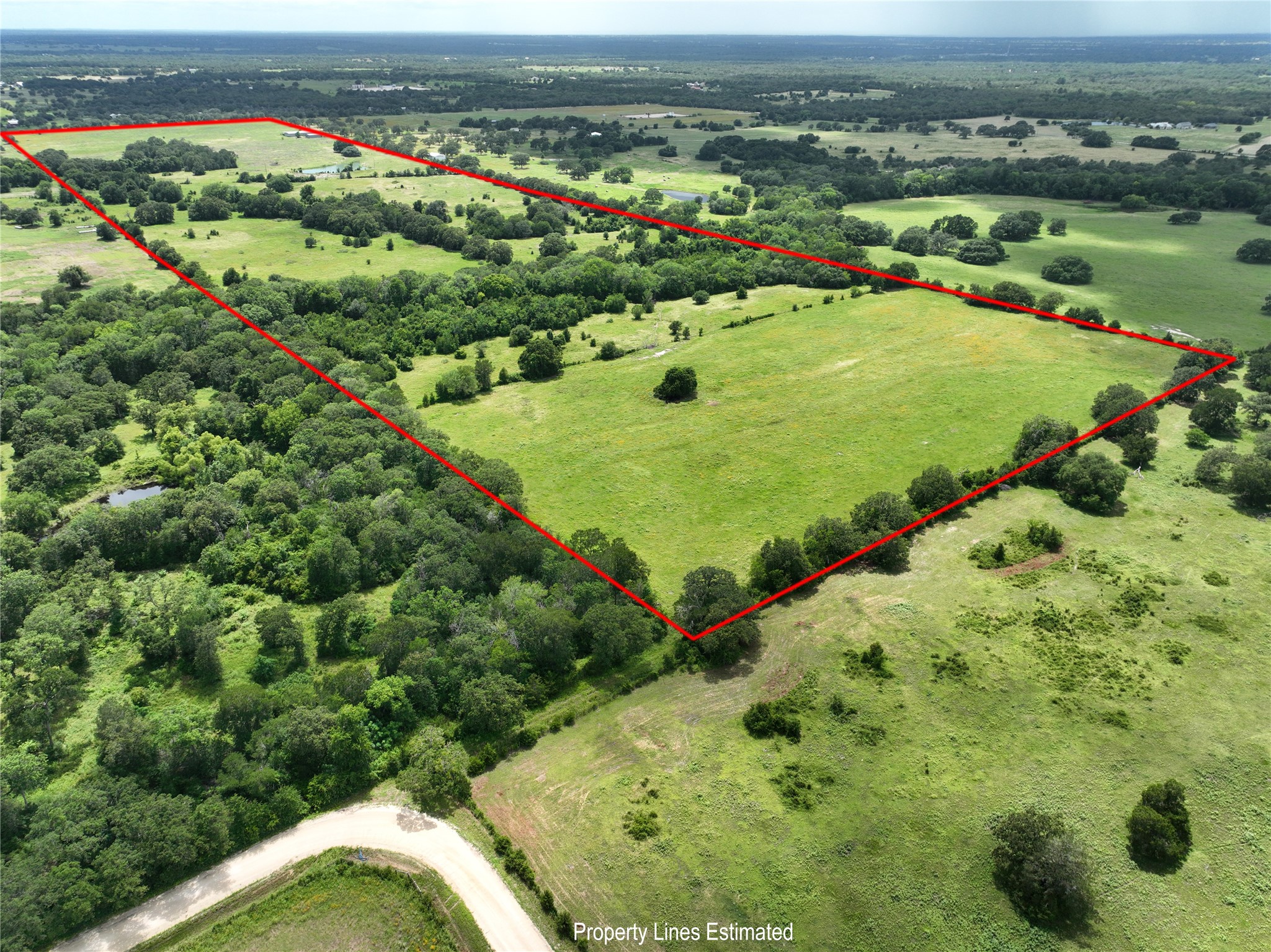 0 Homeyer Mountain Road Burton, TX 77835 - Photo 3 of 17 an aerial view of a golf course with parking space